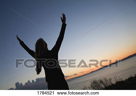 Stock Image - Woman worshipping. Fotosearch