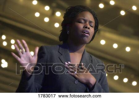 Stock Photo - Woman worshipping. Fotosearch