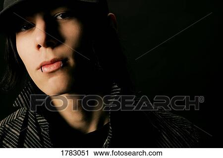 Young man with piercings View Large Photo Image Stock Image - Young man with piercings. Fotosearch