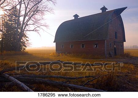 A barn sits in morning mist View Large Photo Image Stock Photography - A barn sits in morning mist. Fotosearch