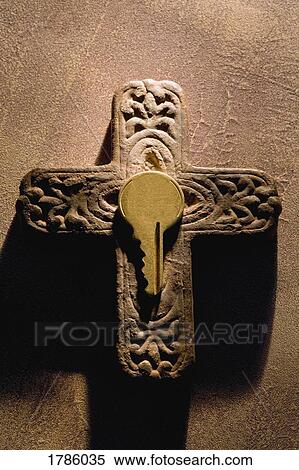 Stock Photography - A key and a cross. Fotosearch