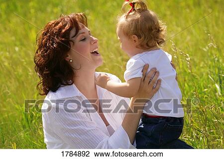A mother and daughter View Large Photo Image Stock Image - A mother and daughter. Fotosearch