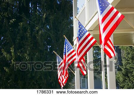 Stock Image - A row of American flags. Fotosearch