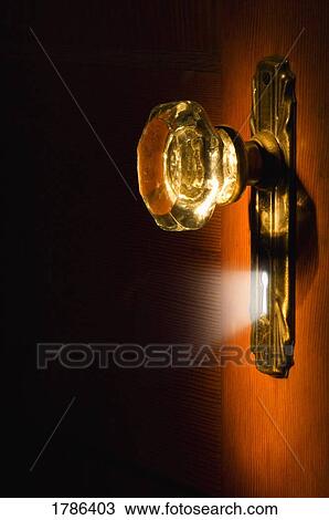 Stock Image - Antique glass doorknob. Fotosearch
