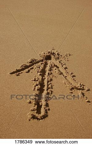 Stock Photo - Arrow written in sand. Fotosearch