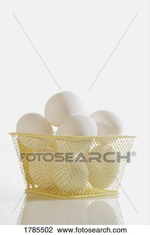 Basket of eggs View Large Photo Image Stock Image - Basket of eggs. Fotosearch