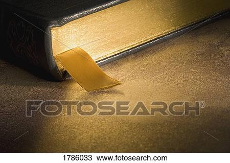Stock Image - bookmark in Bible. Fotosearch