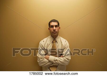 Businessman with arms crossed View Large Photo Image Stock Image - Businessman with arms crossed. Fotosearch