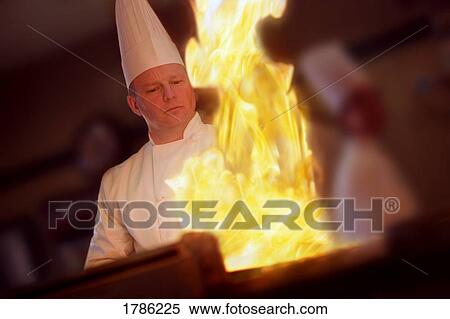 Stock Photography - Chef in the kitchen. Fotosearch