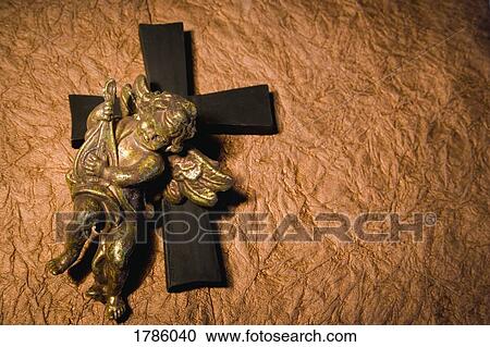 Cherub and cross View Large Photo Image Stock Image - Cherub and cross. Fotosearch