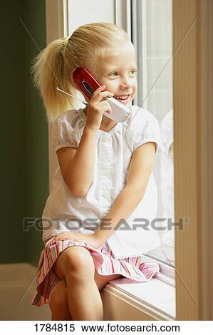 Child talking on cell phone View Large Photo Image Stock Photography - Child talking on cell phone. Fotosearch