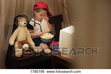 Child watches baseball game on television View Large Photo Image Stock Photography - Child watches baseball game on television. Fotosearch