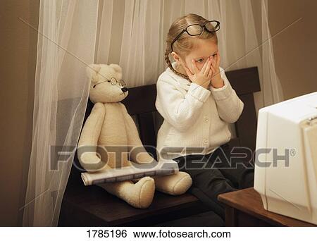 Child watching something frightening on TV View Large Photo Image Stock Photograph - Child watching something frightening on TV. Fotosearch