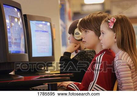 Children on computers View Large Photo Image Stock Photography - Children on computers. Fotosearch