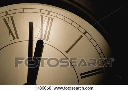 Close-up of a wall clock View Large Photo Image Stock Photo - Close-up of a wall clock. Fotosearch