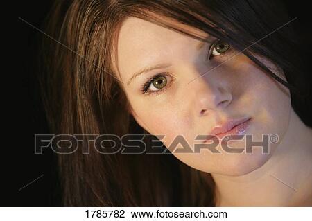 Stock Image - Closeup of woman's face. Fotosearch