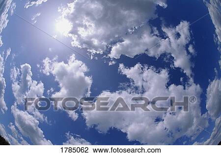 Clouds in blue sky View Large Photo Image Stock Image - Clouds in blue sky. Fotosearch
