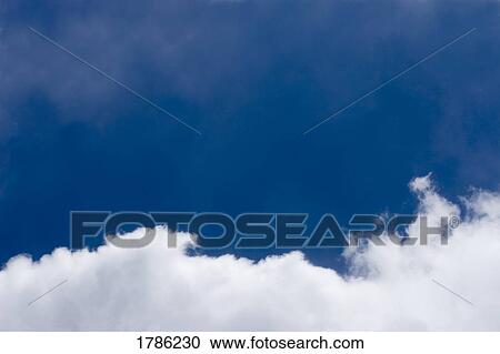 Stock Image - Clouds in the sky. Fotosearch