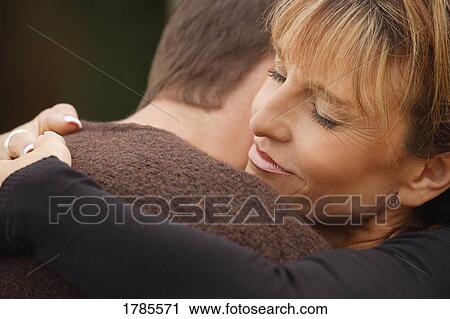 Stock Image - Couple embracing. Fotosearch