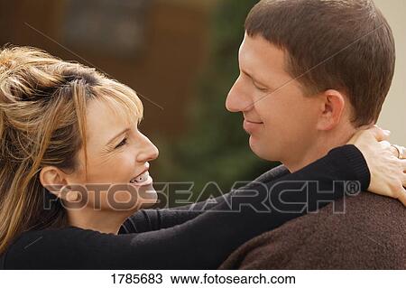 Stock Image - Couple embracing. Fotosearch