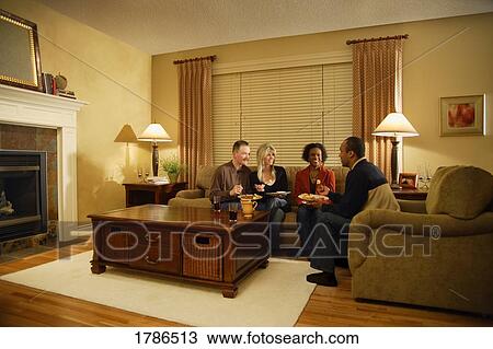 Couples eating together View Large Photo Image Stock Image - Couples eating together. Fotosearch
