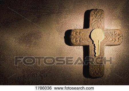 Stock Photograph - cross and a key. Fotosearch