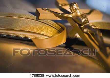 Crucifix and a Bible View Large Photo Image Stock Photo - Crucifix and a Bible. Fotosearch