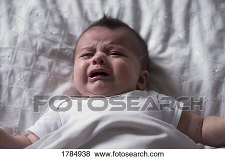 Crying baby View Large Photo Image Stock Photo - Crying baby. Fotosearch