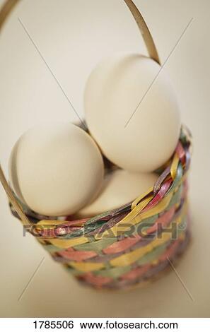 Stock Photograph - Easter egg basket. Fotosearch