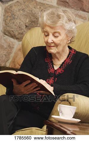 Elderly woman reading View Large Photo Image Stock Image - Elderly woman reading. Fotosearch