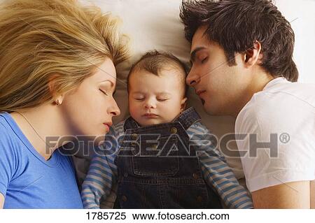 Stock Photography - Family sleeping. Fotosearch