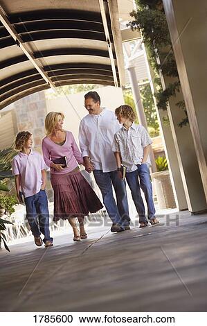 Family walking together View Large Photo Image Stock Image - Family walking together. Fotosearch
