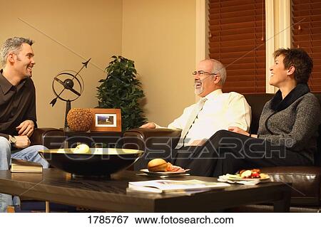 Friends having a visit View Large Photo Image Stock Photo - Friends having a visit. Fotosearch