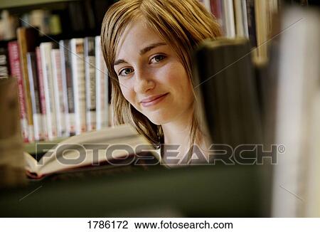 Girl at library View Large Photo Image Stock Image - Girl at library. Fotosearch
