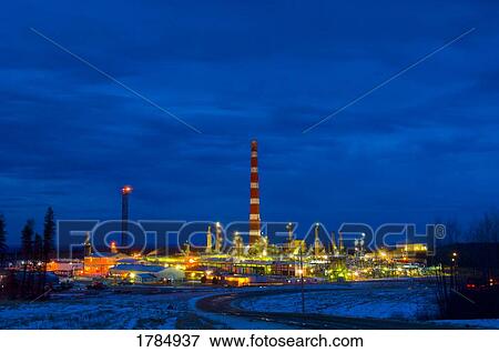 Stock Photo - Illuminated industrial gas plant. Fotosearch