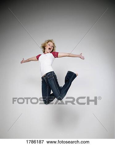 Jumping for joy View Large Photo Image Stock Photo - Jumping for joy. Fotosearch