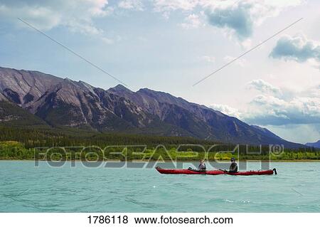 Stock Photo - Kayaking on a lake. Fotosearch