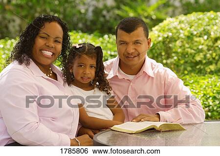 Stock Photograph - Latino family. Fotosearch