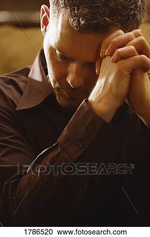 Man praying View Large Photo Image Stock Image - Man praying. Fotosearch