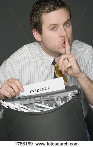 Man shredding evidence View Large Photo Image Stock Photo - Man shredding evidence. Fotosearch