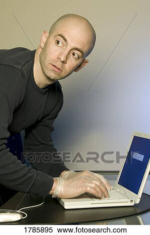 Man Stealing Information View Large Photo Image Stock Photography - Man Stealing Information. Fotosearch
