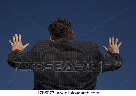 Man with hands outstretched View Large Photo Image Stock Photo - Man with hands outstretched. Fotosearch