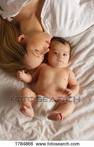 Stock Photograph - Mother and child from above. Fotosearch