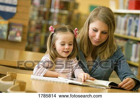 Picture - Mother and Daughter Reading. Fotosearch