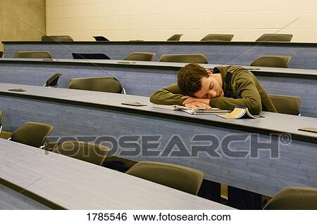 Stock Photograph - Over tired student. Fotosearch