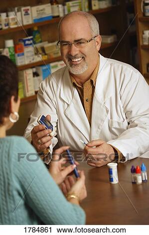 Pharmacist with patient View Large Photo Image Stock Image - Pharmacist with patient. Fotosearch