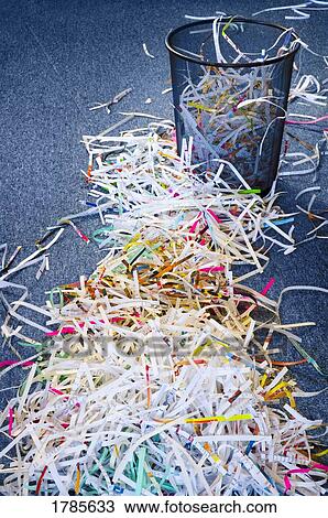 Pile of shredded paper leading to garbage can View Large Photo Image Stock Image - Pile of shredded paper leading to garbage can. Fotosearch