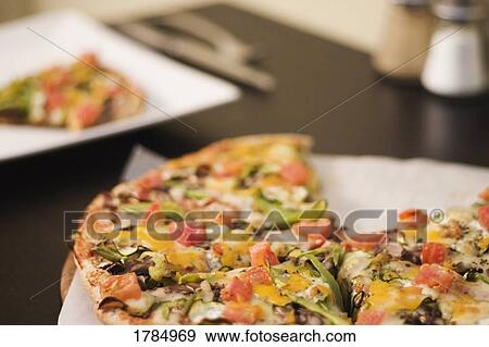 Stock Photo - Pizza dinner. Fotosearch