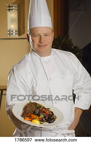 Portrait of a chef View Large Photo Image Stock Photo - Portrait of a chef. Fotosearch