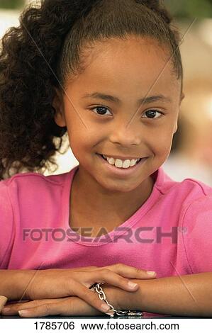 Stock Photograph - Portrait of a young girl. Fotosearch